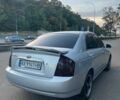 Сірий Кіа Черато, об'ємом двигуна 2 л та пробігом 350 тис. км за 4100 $, фото 3 на Automoto.ua