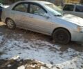 Серый Киа Черато, объемом двигателя 2 л и пробегом 247 тыс. км за 4000 $, фото 2 на Automoto.ua