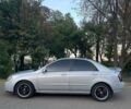 Серый Киа Черато, объемом двигателя 2 л и пробегом 350 тыс. км за 4300 $, фото 6 на Automoto.ua