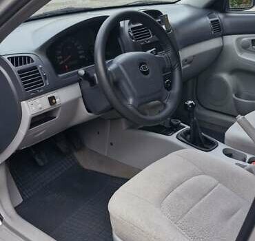 Сірий Кіа Черато, об'ємом двигуна 1.6 л та пробігом 259 тис. км за 4000 $, фото 3 на Automoto.ua