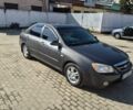 Серый Киа Черато, объемом двигателя 1.6 л и пробегом 307 тыс. км за 4600 $, фото 1 на Automoto.ua