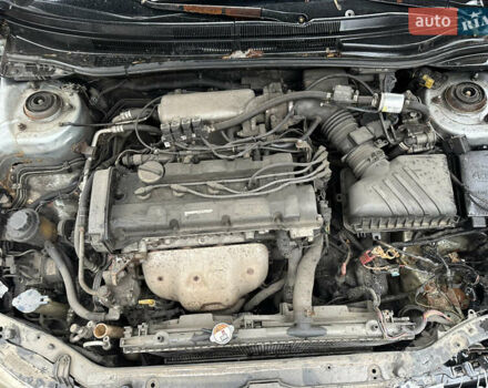 Сірий Кіа Черато, об'ємом двигуна 2 л та пробігом 280 тис. км за 2300 $, фото 1 на Automoto.ua