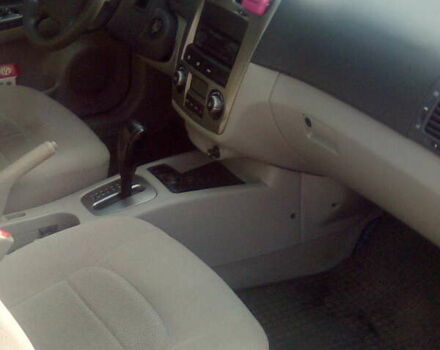 Серый Киа Черато, объемом двигателя 2 л и пробегом 255 тыс. км за 4700 $, фото 4 на Automoto.ua