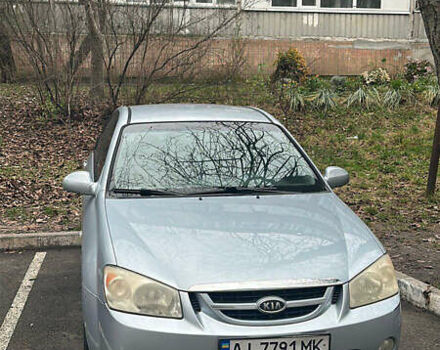 Серый Киа Черато, объемом двигателя 2 л и пробегом 214 тыс. км за 4700 $, фото 2 на Automoto.ua