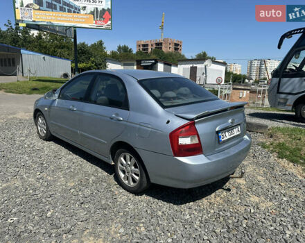 Серый Киа Черато, объемом двигателя 2 л и пробегом 250 тыс. км за 2850 $, фото 2 на Automoto.ua