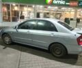 Серый Киа Черато, объемом двигателя 2 л и пробегом 230 тыс. км за 2600 $, фото 2 на Automoto.ua