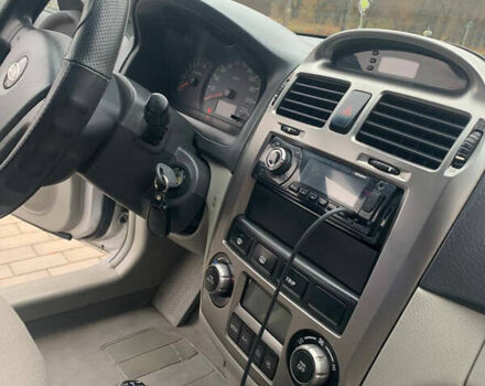 Серый Киа Черато, объемом двигателя 1.98 л и пробегом 250 тыс. км за 3800 $, фото 3 на Automoto.ua