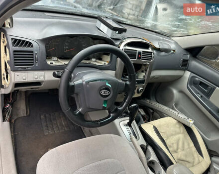 Сірий Кіа Черато, об'ємом двигуна 2 л та пробігом 280 тис. км за 2100 $, фото 15 на Automoto.ua