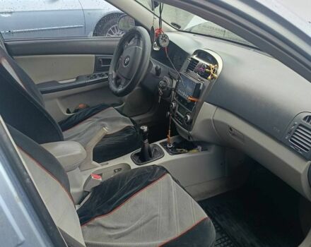 Серый Киа Черато, объемом двигателя 2 л и пробегом 230 тыс. км за 3000 $, фото 6 на Automoto.ua