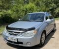 Серый Киа Черато, объемом двигателя 1.6 л и пробегом 180 тыс. км за 3650 $, фото 1 на Automoto.ua