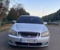 Серый Киа Черато, объемом двигателя 2 л и пробегом 350 тыс. км за 4300 $, фото 4 на Automoto.ua