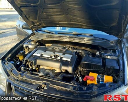 Серый Киа Черато, объемом двигателя 1.6 л и пробегом 255 тыс. км за 4000 $, фото 7 на Automoto.ua