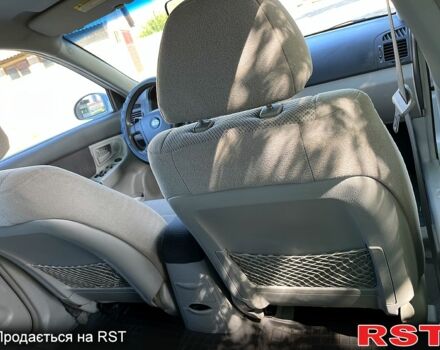 Серый Киа Черато, объемом двигателя 1.6 л и пробегом 235 тыс. км за 3700 $, фото 13 на Automoto.ua