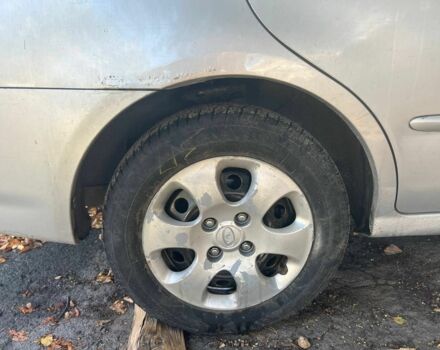 Серый Киа Черато, объемом двигателя 1.6 л и пробегом 300 тыс. км за 4200 $, фото 6 на Automoto.ua