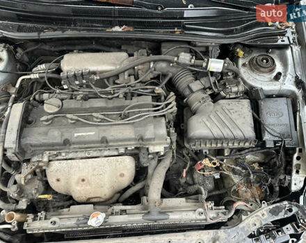 Сірий Кіа Черато, об'ємом двигуна 2 л та пробігом 280 тис. км за 2300 $, фото 3 на Automoto.ua