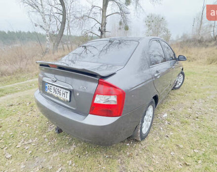 Серый Киа Черато, объемом двигателя 2 л и пробегом 180 тыс. км за 3800 $, фото 6 на Automoto.ua