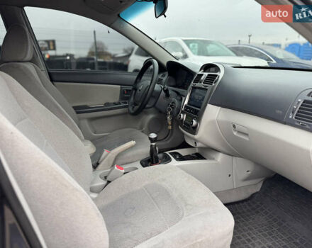 Сірий Кіа Черато, об'ємом двигуна 1.6 л та пробігом 290 тис. км за 3800 $, фото 11 на Automoto.ua