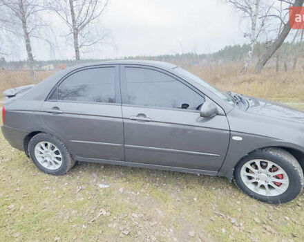 Серый Киа Черато, объемом двигателя 2 л и пробегом 180 тыс. км за 3800 $, фото 4 на Automoto.ua