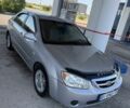 Серый Киа Черато, объемом двигателя 2 л и пробегом 220 тыс. км за 4898 $, фото 1 на Automoto.ua