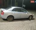 Серый Киа Черато, объемом двигателя 2 л и пробегом 230 тыс. км за 2600 $, фото 4 на Automoto.ua