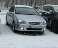 Серый Киа Черато, объемом двигателя 2 л и пробегом 248 тыс. км за 4400 $, фото 1 на Automoto.ua