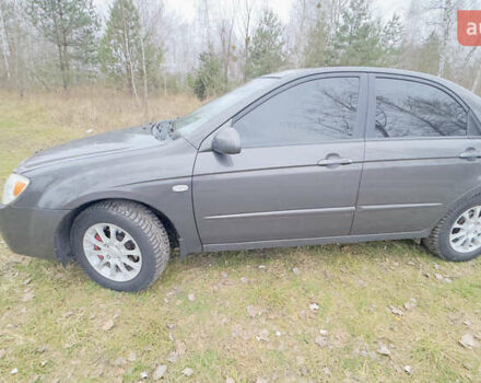 Серый Киа Черато, объемом двигателя 2 л и пробегом 180 тыс. км за 3800 $, фото 10 на Automoto.ua