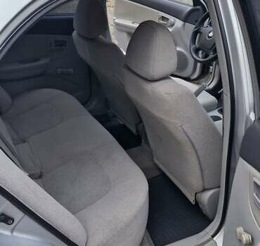 Сірий Кіа Черато, об'ємом двигуна 1.6 л та пробігом 259 тис. км за 4000 $, фото 5 на Automoto.ua