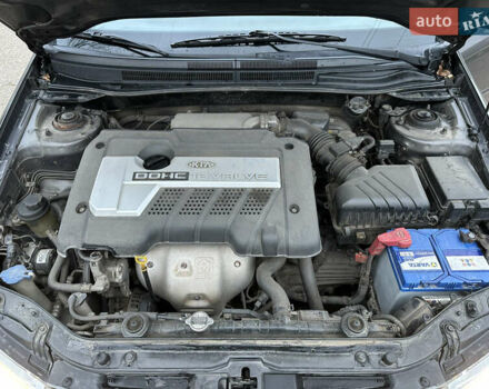 Серый Киа Черато, объемом двигателя 1.98 л и пробегом 213 тыс. км за 4900 $, фото 30 на Automoto.ua