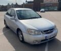 Сірий Кіа Черато, об'ємом двигуна 1.98 л та пробігом 270 тис. км за 2499 $, фото 1 на Automoto.ua