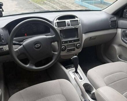 Серый Киа Черато, объемом двигателя 1.98 л и пробегом 200 тыс. км за 3150 $, фото 2 на Automoto.ua