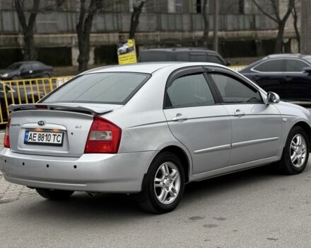 Серый Киа Черато, объемом двигателя 2 л и пробегом 240 тыс. км за 4300 $, фото 2 на Automoto.ua