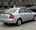 Серый Киа Черато, объемом двигателя 2 л и пробегом 240 тыс. км за 4300 $, фото 2 на Automoto.ua