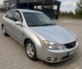 Серый Киа Черато, объемом двигателя 1.6 л и пробегом 110 тыс. км за 3800 $, фото 1 на Automoto.ua