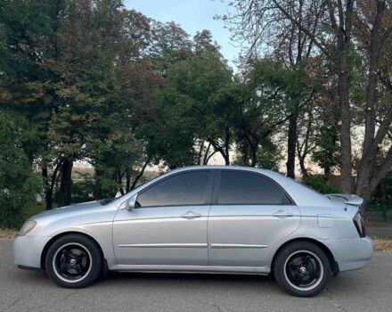Сірий Кіа Черато, об'ємом двигуна 2 л та пробігом 350 тис. км за 4100 $, фото 2 на Automoto.ua