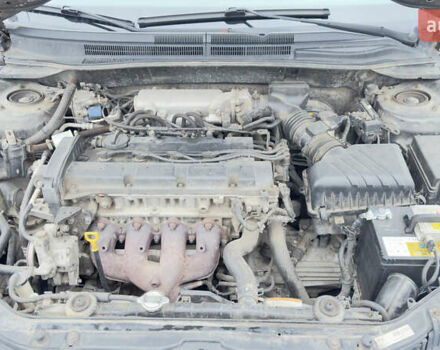 Серый Киа Черато, объемом двигателя 2 л и пробегом 180 тыс. км за 3800 $, фото 2 на Automoto.ua