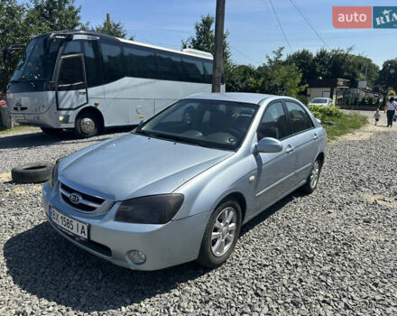 Серый Киа Черато, объемом двигателя 2 л и пробегом 250 тыс. км за 2850 $, фото 1 на Automoto.ua