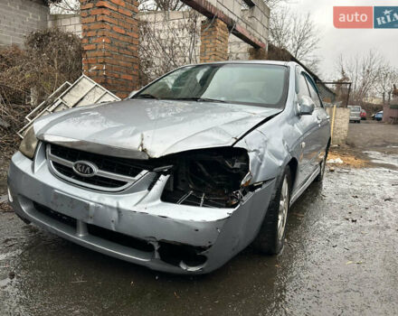 Сірий Кіа Черато, об'ємом двигуна 2 л та пробігом 280 тис. км за 2100 $, фото 3 на Automoto.ua