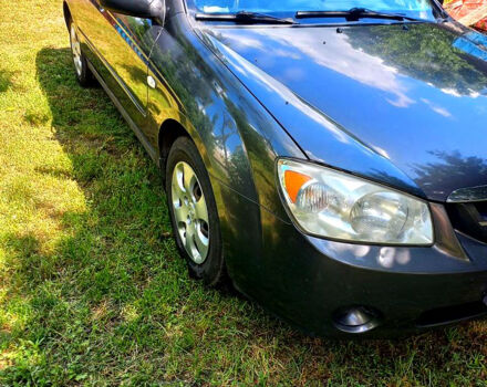 Серый Киа Черато, объемом двигателя 1.6 л и пробегом 300 тыс. км за 3900 $, фото 1 на Automoto.ua