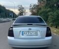 Серый Киа Черато, объемом двигателя 2 л и пробегом 350 тыс. км за 4300 $, фото 5 на Automoto.ua