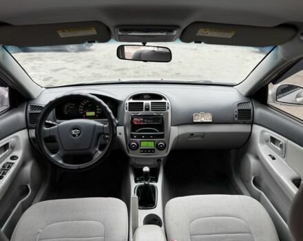 Серый Киа Черато, объемом двигателя 2 л и пробегом 240 тыс. км за 4300 $, фото 6 на Automoto.ua