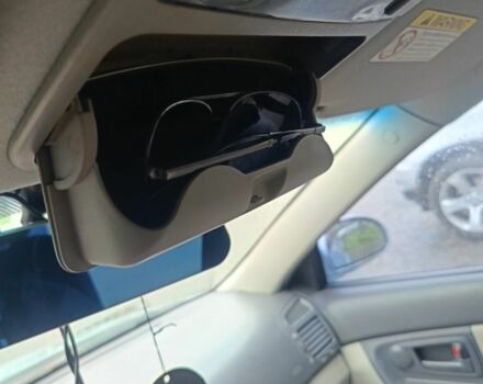 Серый Киа Черато, объемом двигателя 2 л и пробегом 230 тыс. км за 3000 $, фото 2 на Automoto.ua