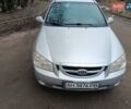 Серый Киа Черато, объемом двигателя 2 л и пробегом 198 тыс. км за 4200 $, фото 1 на Automoto.ua