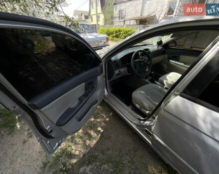 Сірий Кіа Черато, об'ємом двигуна 1.6 л та пробігом 180 тис. км за 4300 $, фото 6 на Automoto.ua