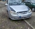 Сірий Кіа Черато, об'ємом двигуна 1.6 л та пробігом 273 тис. км за 3999 $, фото 1 на Automoto.ua