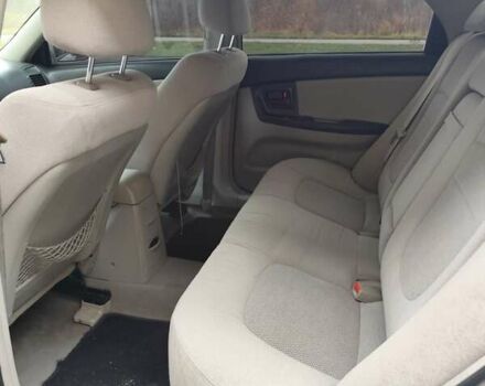 Серый Киа Черато, объемом двигателя 1.6 л и пробегом 200 тыс. км за 3550 $, фото 1 на Automoto.ua