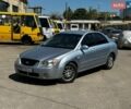 Сірий Кіа Черато, об'ємом двигуна 2 л та пробігом 320 тис. км за 3000 $, фото 1 на Automoto.ua