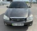 Сірий Кіа Черато, об'ємом двигуна 1.98 л та пробігом 176 тис. км за 4299 $, фото 1 на Automoto.ua