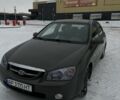 Сірий Кіа Черато, об'ємом двигуна 2 л та пробігом 316 тис. км за 3800 $, фото 1 на Automoto.ua