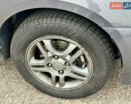 Сірий Кіа Черато, об'ємом двигуна 1.6 л та пробігом 290 тис. км за 3800 $, фото 7 на Automoto.ua