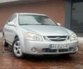Серый Киа Черато, объемом двигателя 2 л и пробегом 260 тыс. км за 3950 $, фото 1 на Automoto.ua